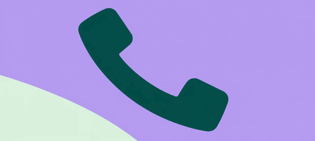 An evergreen telephone handset on lavender with a mint curve